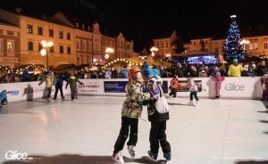 Christmas ice rink with kids skating on it