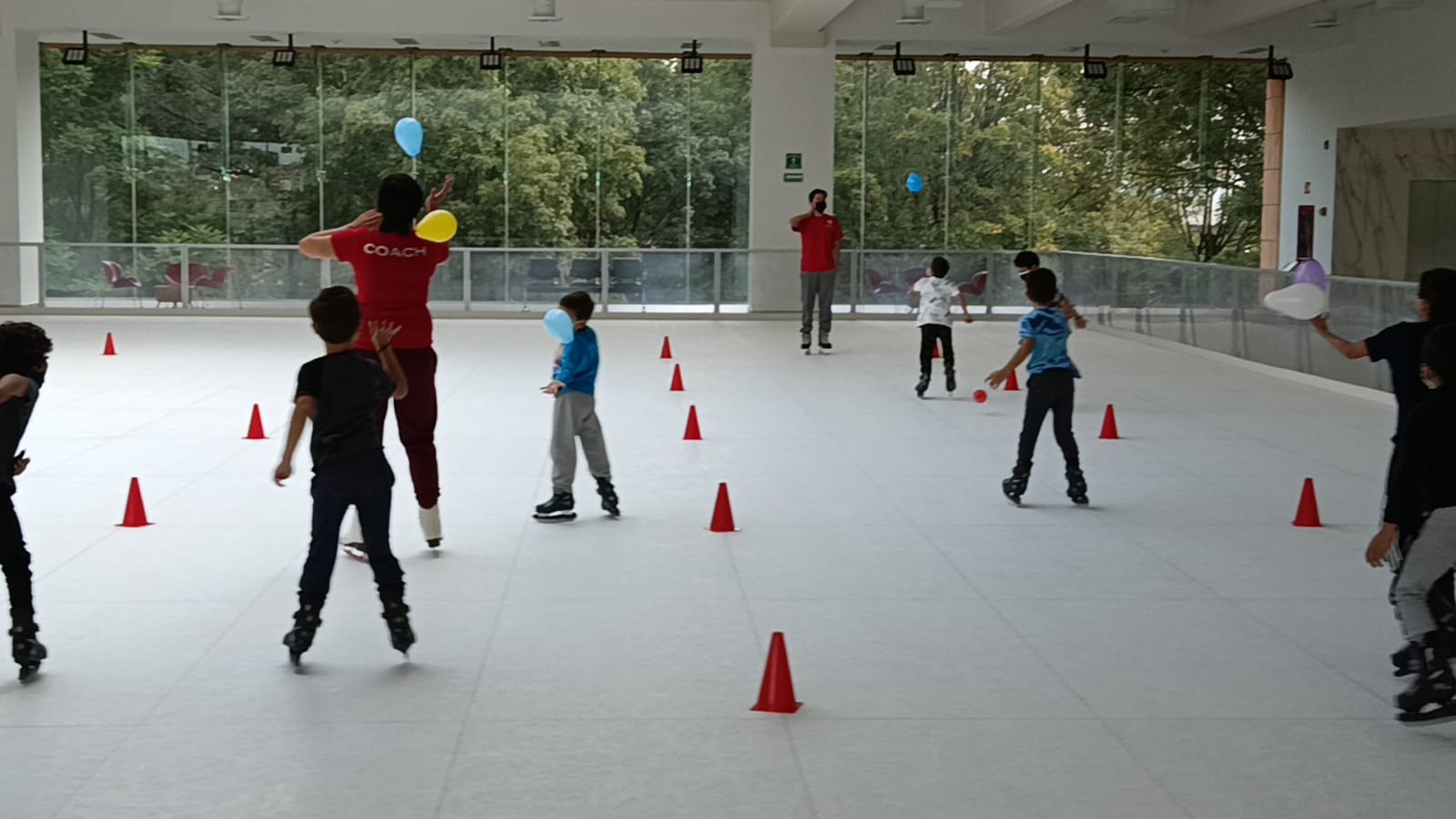 kids learning to ice skate