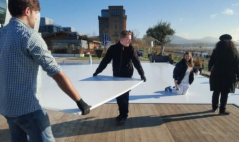 Synthetic ice rink installation in team