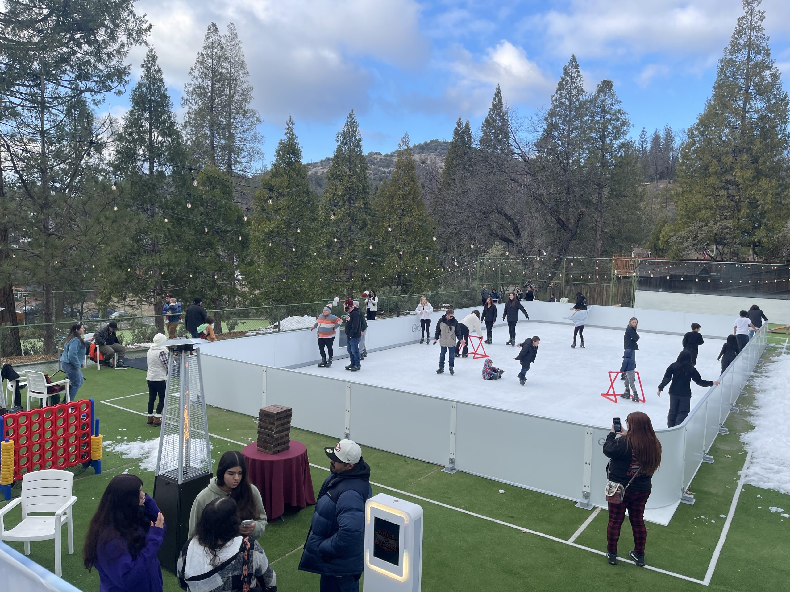 people ice skating on ice rink